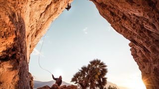 climbers using rope to climb