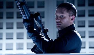 This Means War Tom Hardy readies a sniper rifle on a roof