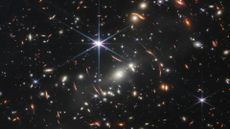 An image showing many sparkling stars and galaxies