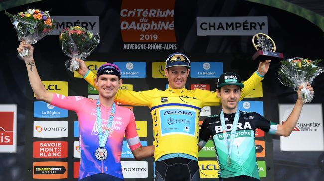 Tejay van Garderen (EF Education First), winner Jakob Fuglsang (Astana) and Bora-Hansgrohe&#039;s Emanuel Buchmann on the final 2019 Criterium du Dauphine podium