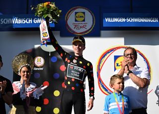 VILLINGENSCHWENNINGEN GERMANY AUGUST 24 Jorgen Nordhagen of Norway and Team Visma Lease a Bike celebrates at podium as Polka Dot Mountain Jersey winner during the 39th Deutschland Tour 2024 Stage 3 a 2111km stage from Schwbisch Gmnd to VillingenSchwenningen UCIWT on August 24 2024 in VillingenSchwenningen Germany Photo by Christian KasparBartkeGetty Images