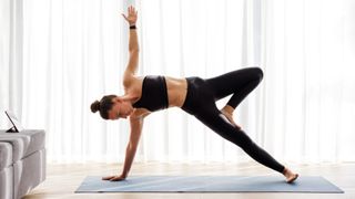 Forget weights this 30 minute Pilates workout for beginners strengthens your abs and hips Tom s Guide