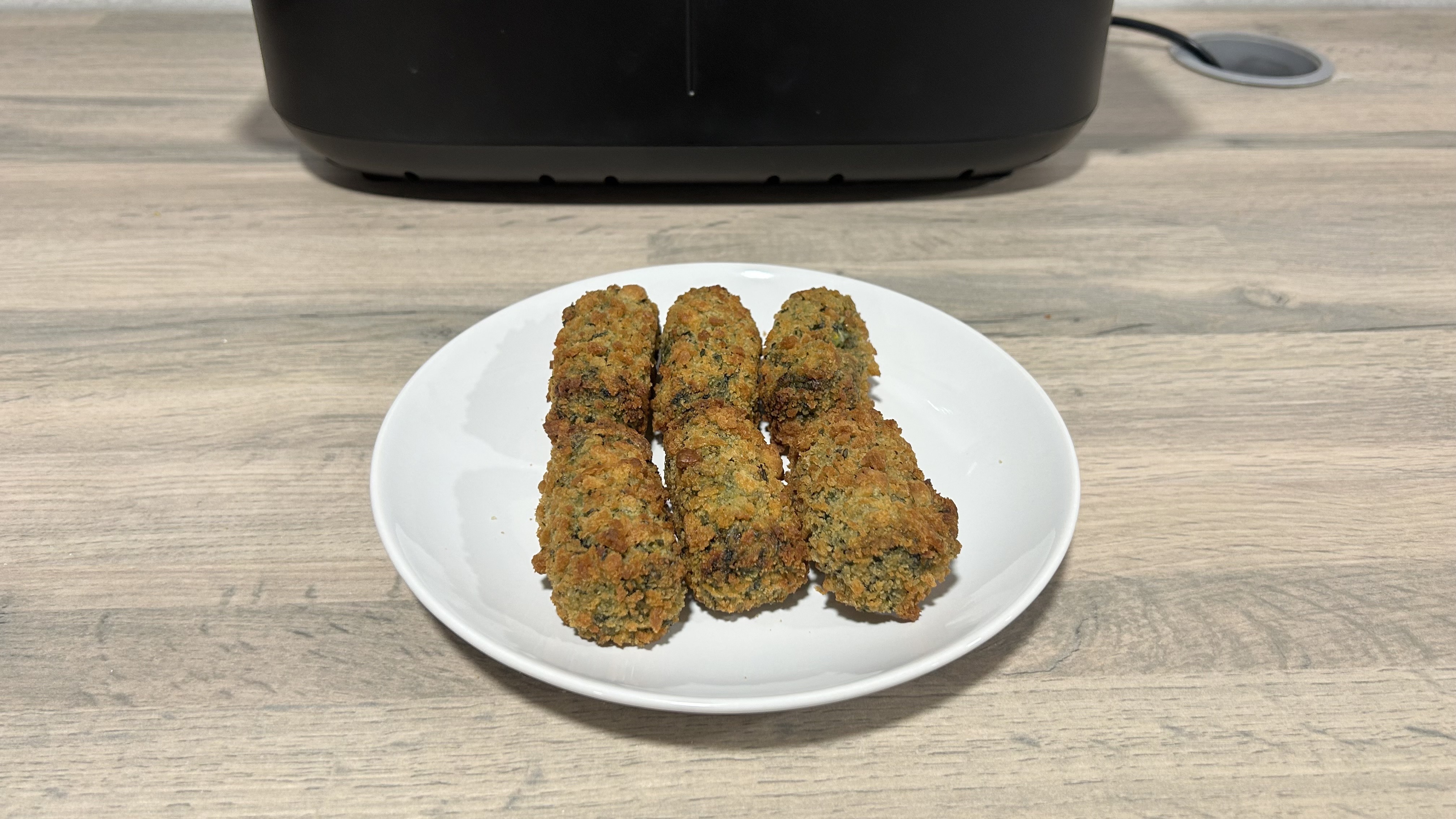 Image of vegetable croquettes cooked in the Philips 1000 Series FlexDrawer Air Fryer.