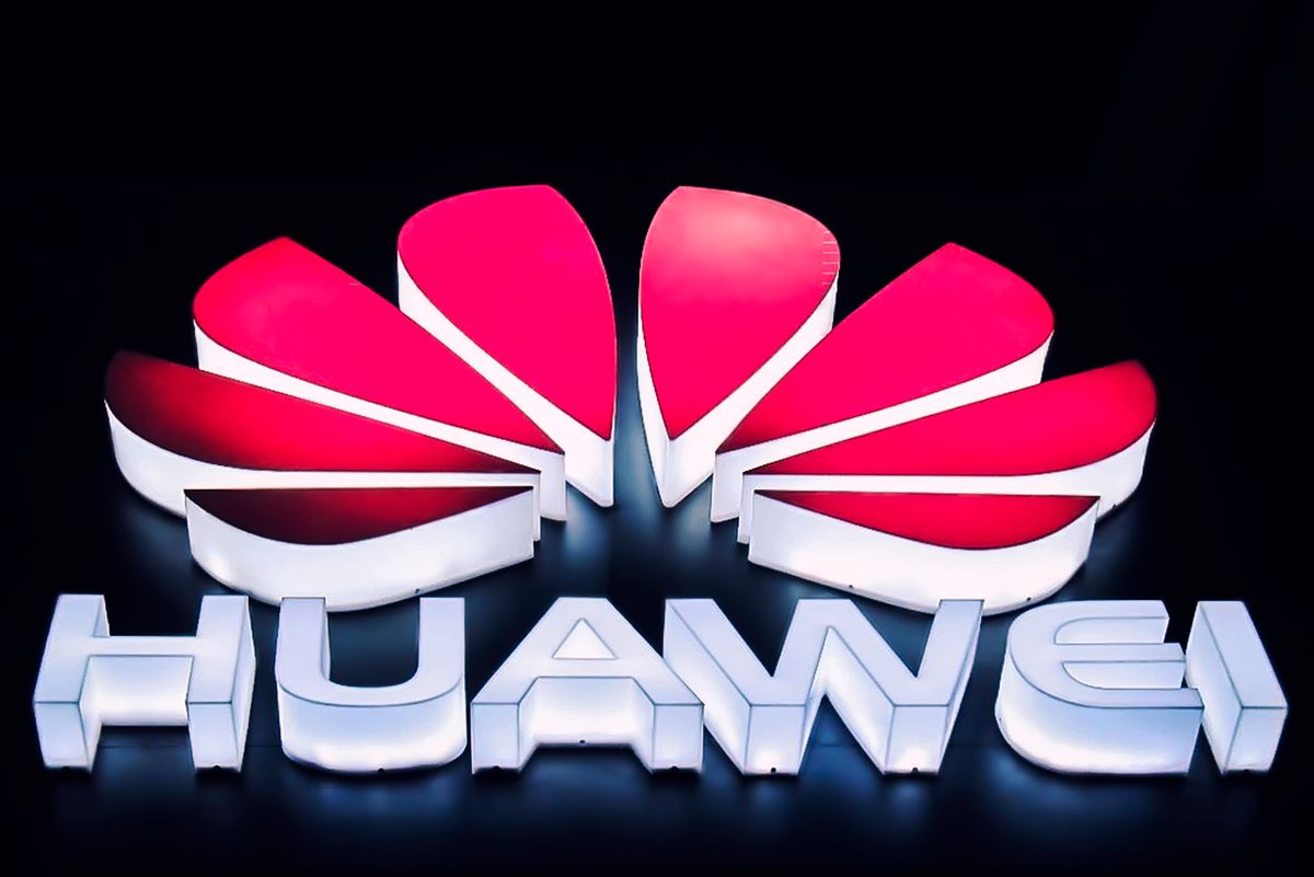 The Huawei logo in lights