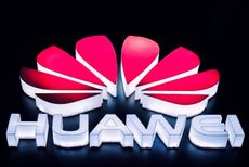The Huawei logo in lights