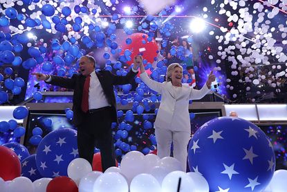 Hillary Clinton, Tim Kaine, and a bunch of balloons.