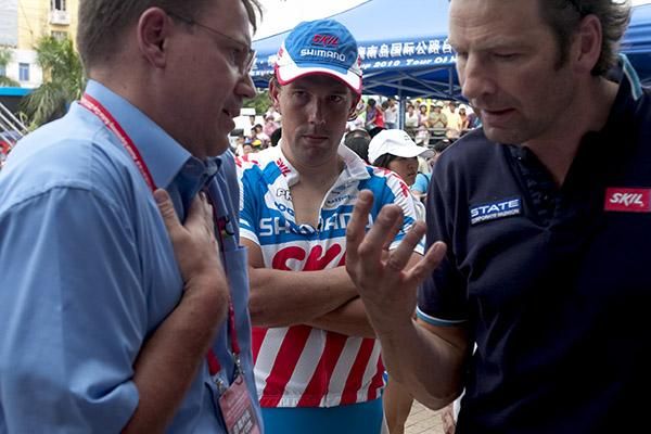 Skil-Shimano's Kenny 'The Hummer' Van Hummel (centre) listens in as Chief Commissaire Alexander Donike and Van Hummel's team-manager, Rudi Kemna, try to unravel the drama that saw Van Hummel stripped of his fourth stage win.