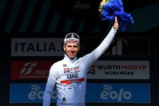 SAN BENEDETTO DEL TRONTO ITALY MARCH 13 Tadej Pogacar of Slovenia and UAE Team Emirates celebrates at podium as White Best Young Rider Jersey winner during the 57th TirrenoAdriatico 2022 Stage 7 a 159km stage from San Benedetto del Tronto to San Benedetto del Tronto TirrenoAdriatico WorldTour on March 13 2022 in San Benedetto del Tronto Italy Photo by Tim de WaeleGetty Images