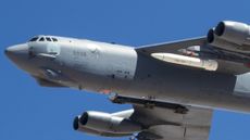 A June 12, 2019 photo shows a B-52 carrying an ARRW prototype (in white, under the left wing) during a test where it was not launched.