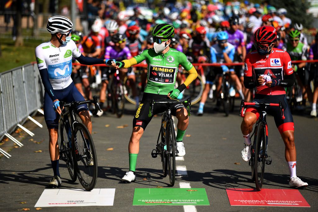 ALTODEMONCALVILLO SPAIN OCTOBER 28 Start Enric Mas Nicolau of Spain and Movistar Team White Best Young Jersey Primoz Roglic of Slovenia and Team Jumbo Visma Green Points Jersey Richard Carapaz of Ecuador and Team INEOS Grenadiers Red Leader Jersey Mask Covid safety measures Social distance during the 75th Tour of Spain 2020 Stage 8 a 164km stage from Logroo to Alto de Moncalvillo 1490m lavuelta LaVuelta20 on October 28 2020 in Alto de Moncalvillo Spain Photo by David RamosGetty Images