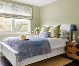 bedroom with pale green walls