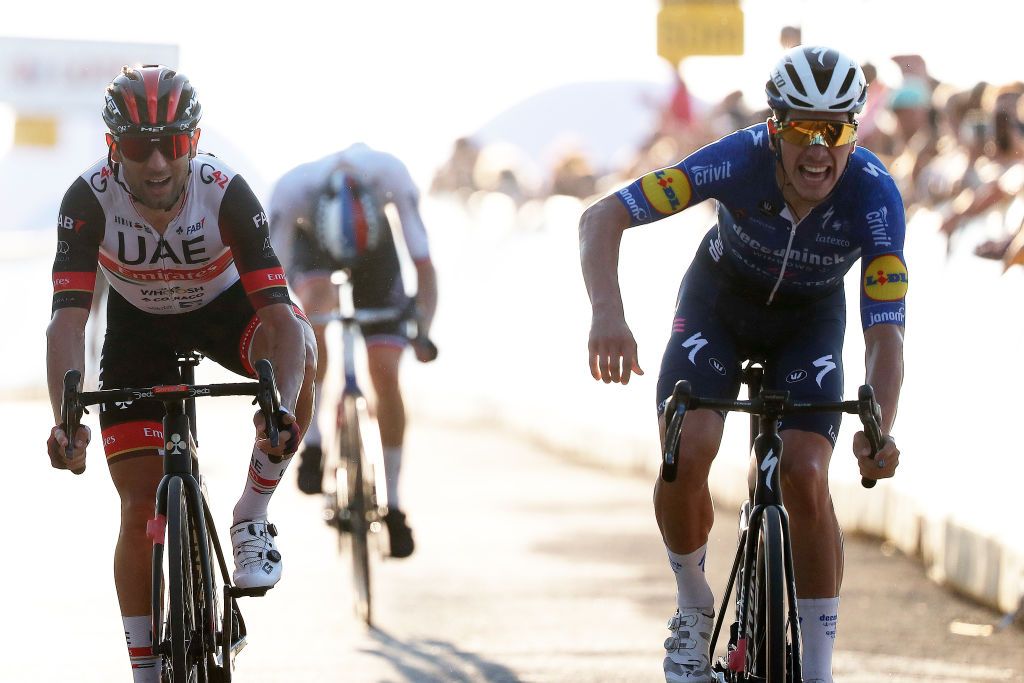 PRZEMYSL POLAND AUGUST 10 Joo Pedro Gonalves Almeida of Portugal and Team Deceuninck QuickStep Diego celebrates at finish line as stage winner ahead of Ulissi of Italy and UAE Team Emirates L during the 78th Tour de Pologne 2021 Stage 2 a 201km stage from Zamo to Przemyl 341m TourdePologne TDP2021 UCIWT on August 10 2021 in Przemysl Poland Photo by Bas CzerwinskiGetty Images