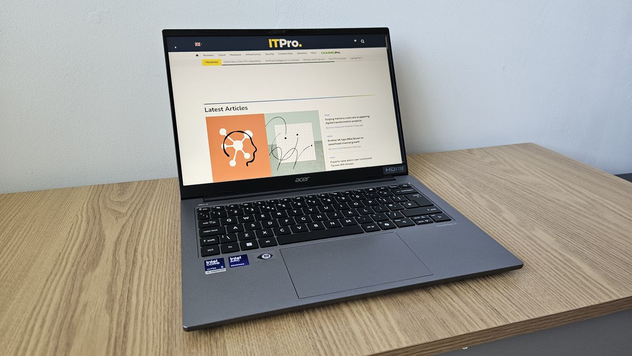The Acer TravelMate X14 AI on a desk