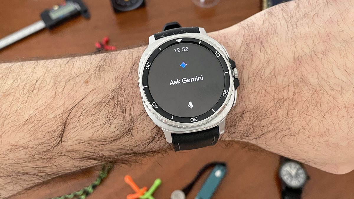Close-up of the Samsung Galaxy Watch 8 Classic on a user's wrist with the Gemini AI app open