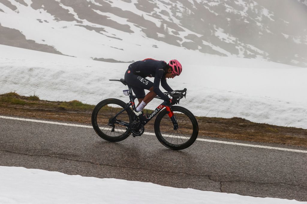 Overall leader Team Ineos rider Colombias Egan Bernal rides ahead of the race in the final descent during the 16th stage of the Giro dItalia 2021 cycling race 153km between Sacile and Cortina dAmpezzo on May 24 2021 Photo by Luca Bettini AFP Photo by LUCA BETTINIAFP via Getty Images