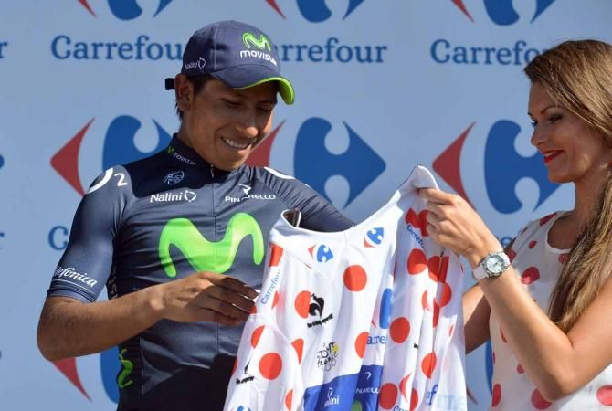 Quintana pulls on the polka-dot jersey