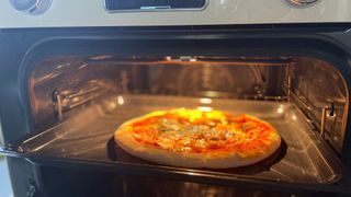 Pizza cooking in the Smeg 10-in-1 Countertop Oven