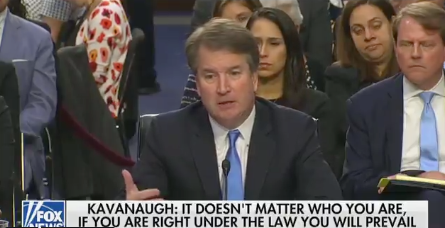 Brett Kavanaugh answers a question at his hearing.