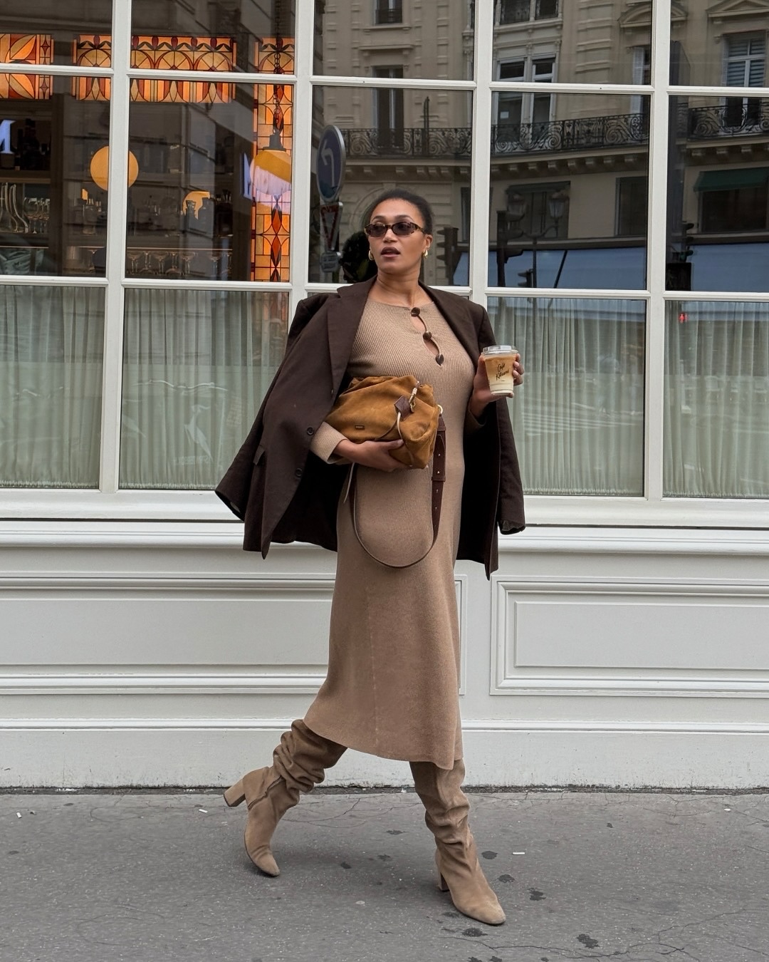 Léna Farouil wearing brown slouchy boots