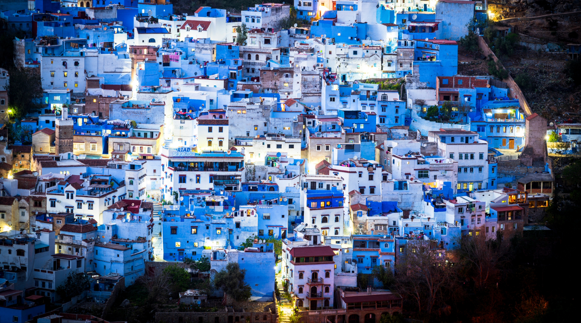 A cityscape lights up the coast of Morocco