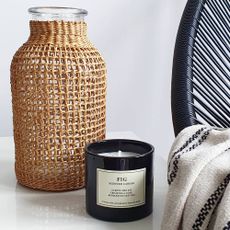 Wilko seagrass vase on side table