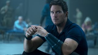 Chris Pratt sits with a look of concern in The Tomorrow War.