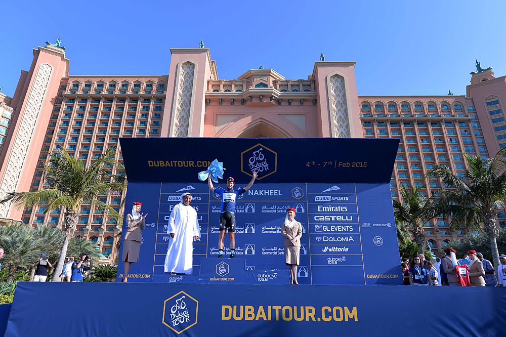 Elia Viviani dwarfed by the podium