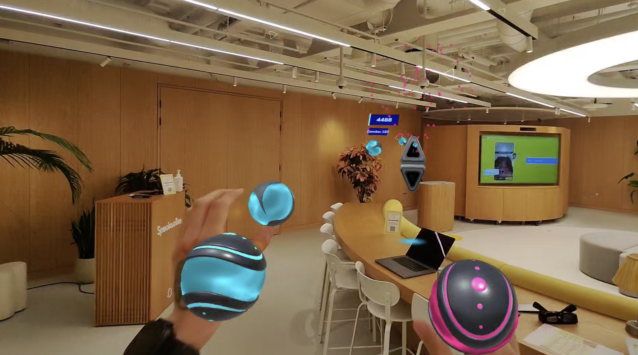 Playing Synth Riders on a pair of Snap Specs smart glasses