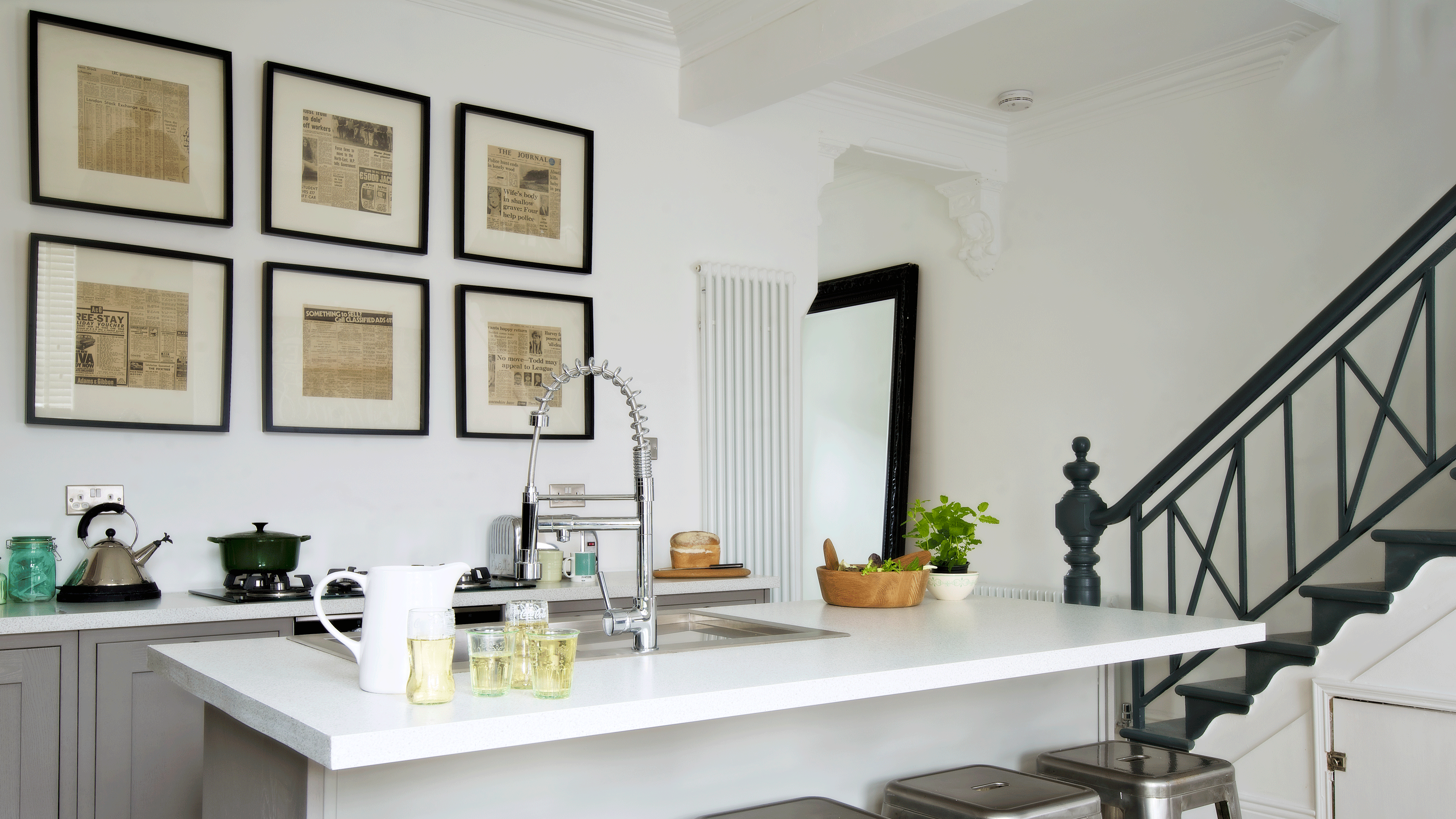 Frames in a white kitchen