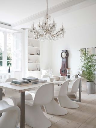All white dining room with vintage decor