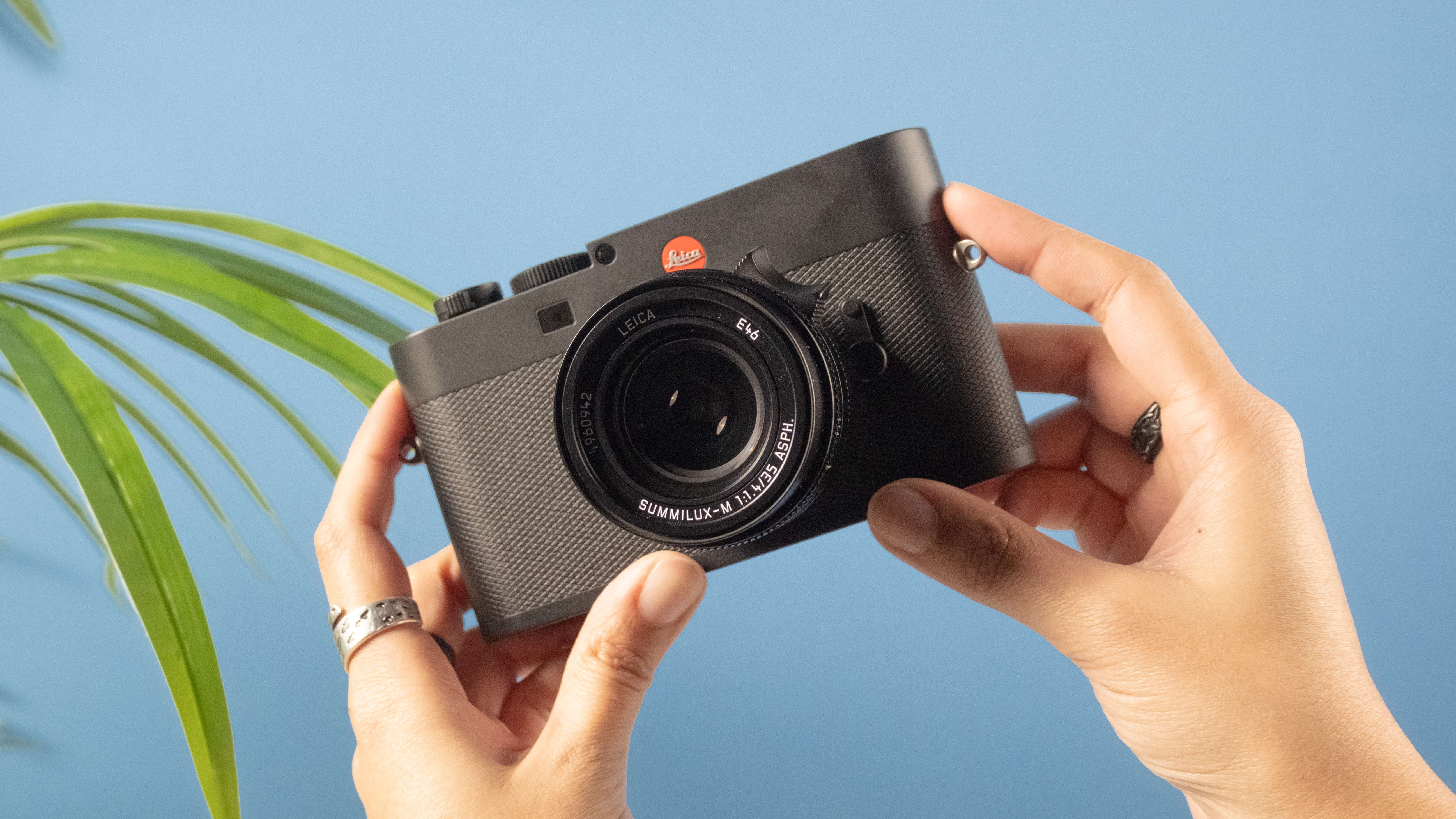 A black Leica M EV1 full frame mirrorless camera