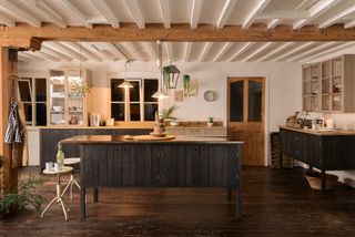 kitchen with a wooden panelled kitchen island