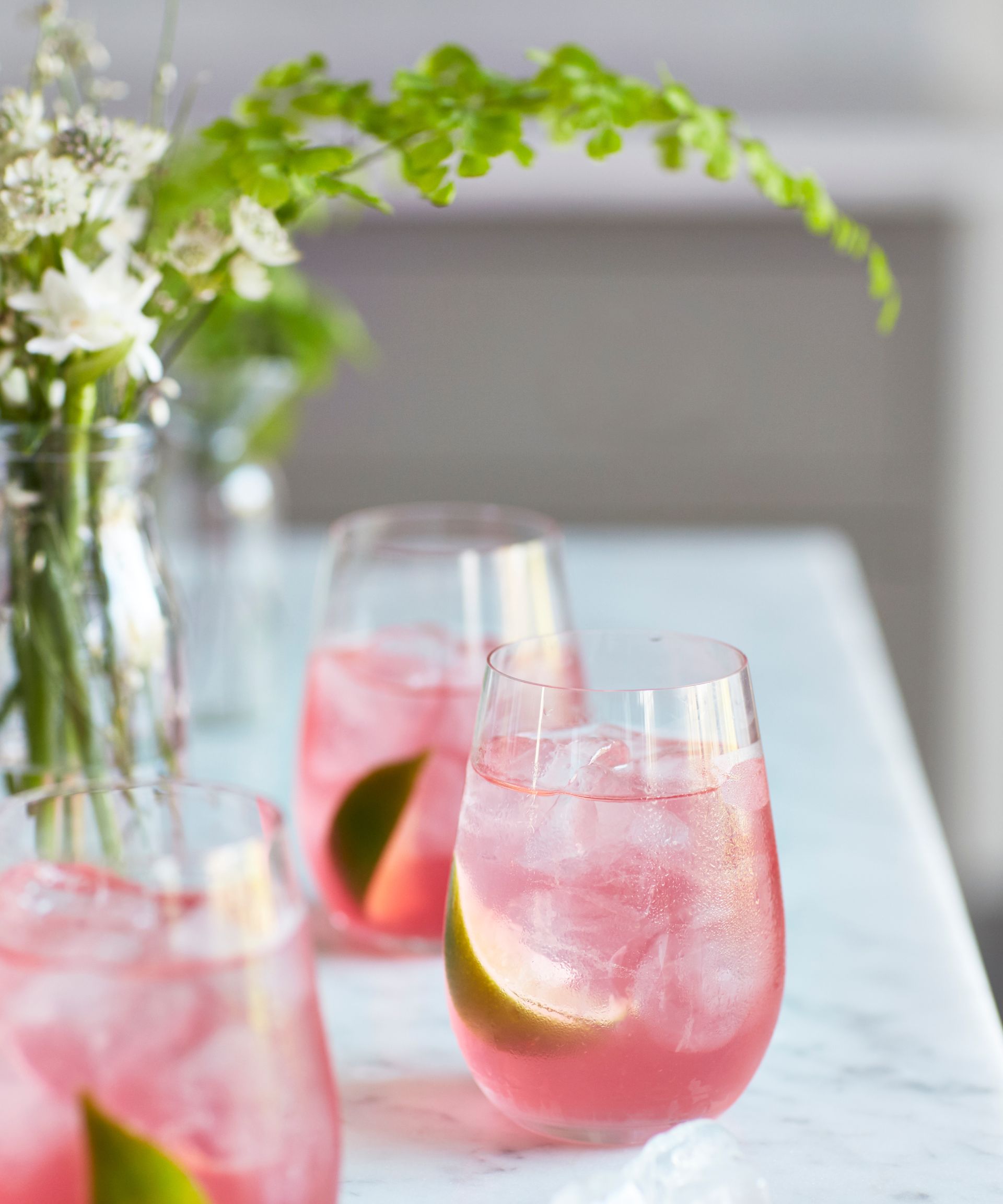 Image of a sherry cosmopolitan cocktail on a kitchen worktop