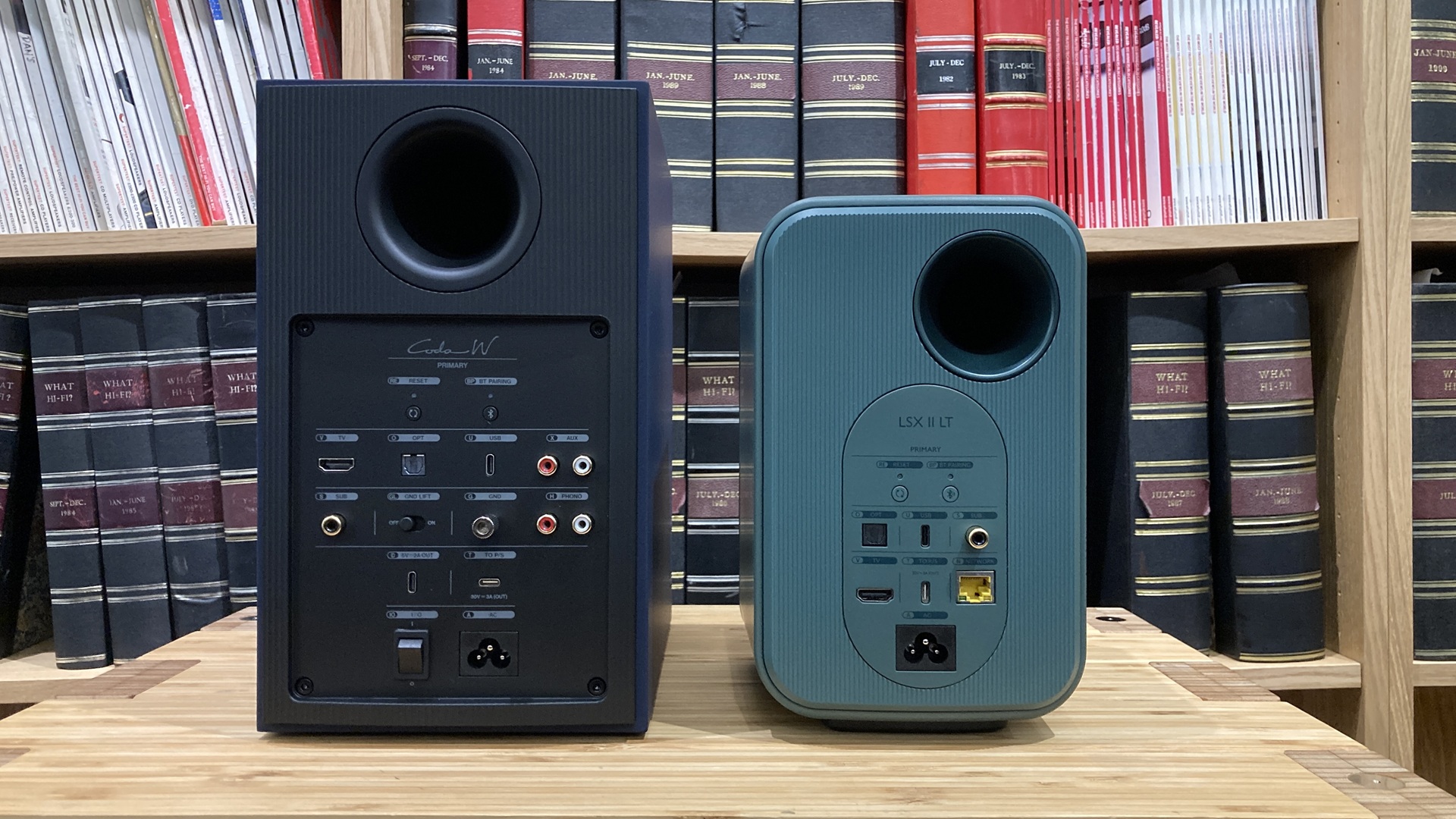 Rear view of KEF Coda W and LSX II LT showcasing their inputs and outputs