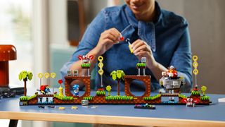 Lego Sonic being built by woman