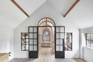 wood and brick in tactile composition define Dorset library in renovated outbuilding