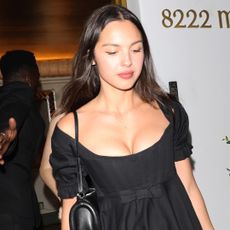 Olivia Rodrigo made a surprise appearance at a 2025 Emmys after-party in a little black dress