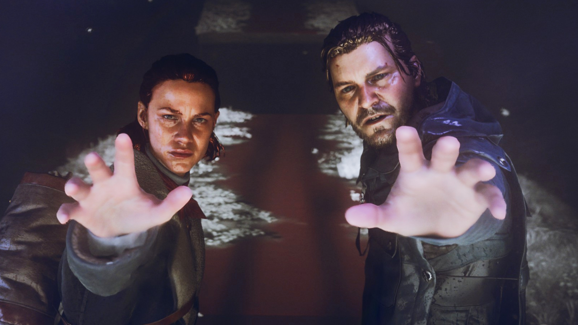 Jesse and Dylan Faden with hands outstretched, working paranatural magic.