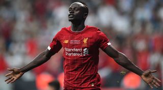 Liverpool's Senegalese striker Sadio Mane celebrates after scoring a goal during the UEFA Super Cup 2019 football match between FC Liverpool and FC Chelsea at Besiktas Park Stadium in Istanbul on August 14, 2019. (Photo by Bulent Kilic / AFP) (Photo credit should read BULENT KILIC/AFP via Getty Images)