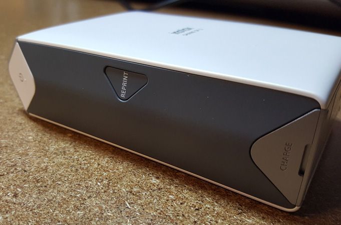 Fujifilm Instax SHARE SP-2 image: A power button lets you turn the printer on and off, while a reprint button lets you print the same photo again without resending it to the printer.