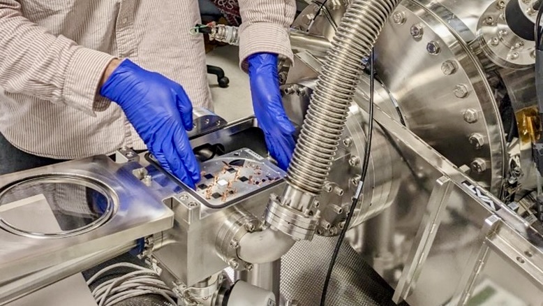 Lead author prepares a silicon chip for enrichment in the lab