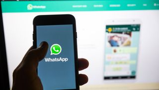WhatsApp on both a phone and a desktop.