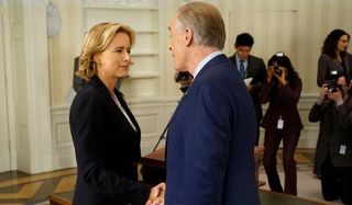 Madam Secretary Secretary McCord shake hands with the president in the Oval Office