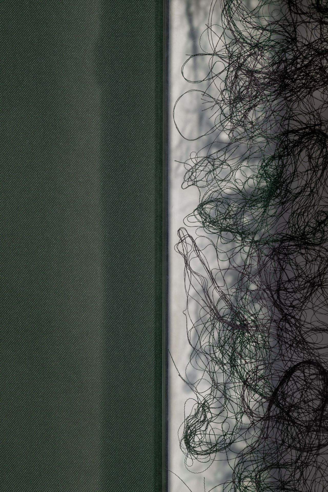 Abstract shapes and shadows made using colourful textiles and glass