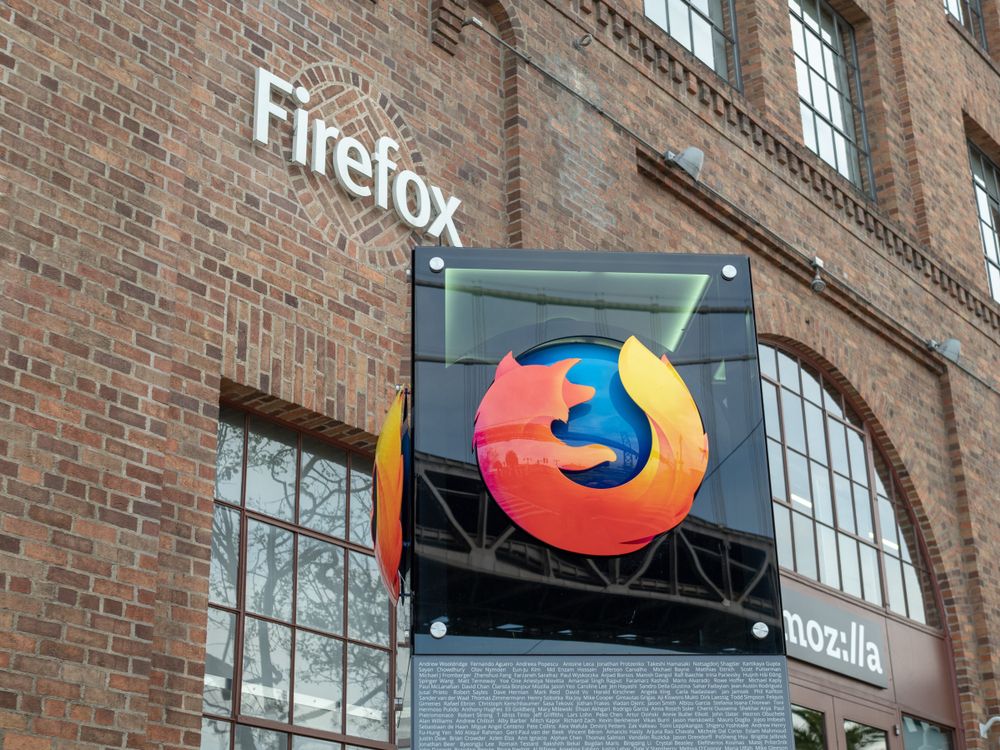 Firefox sign in front of a brick building