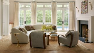 A curved sofa in a contemporary living room