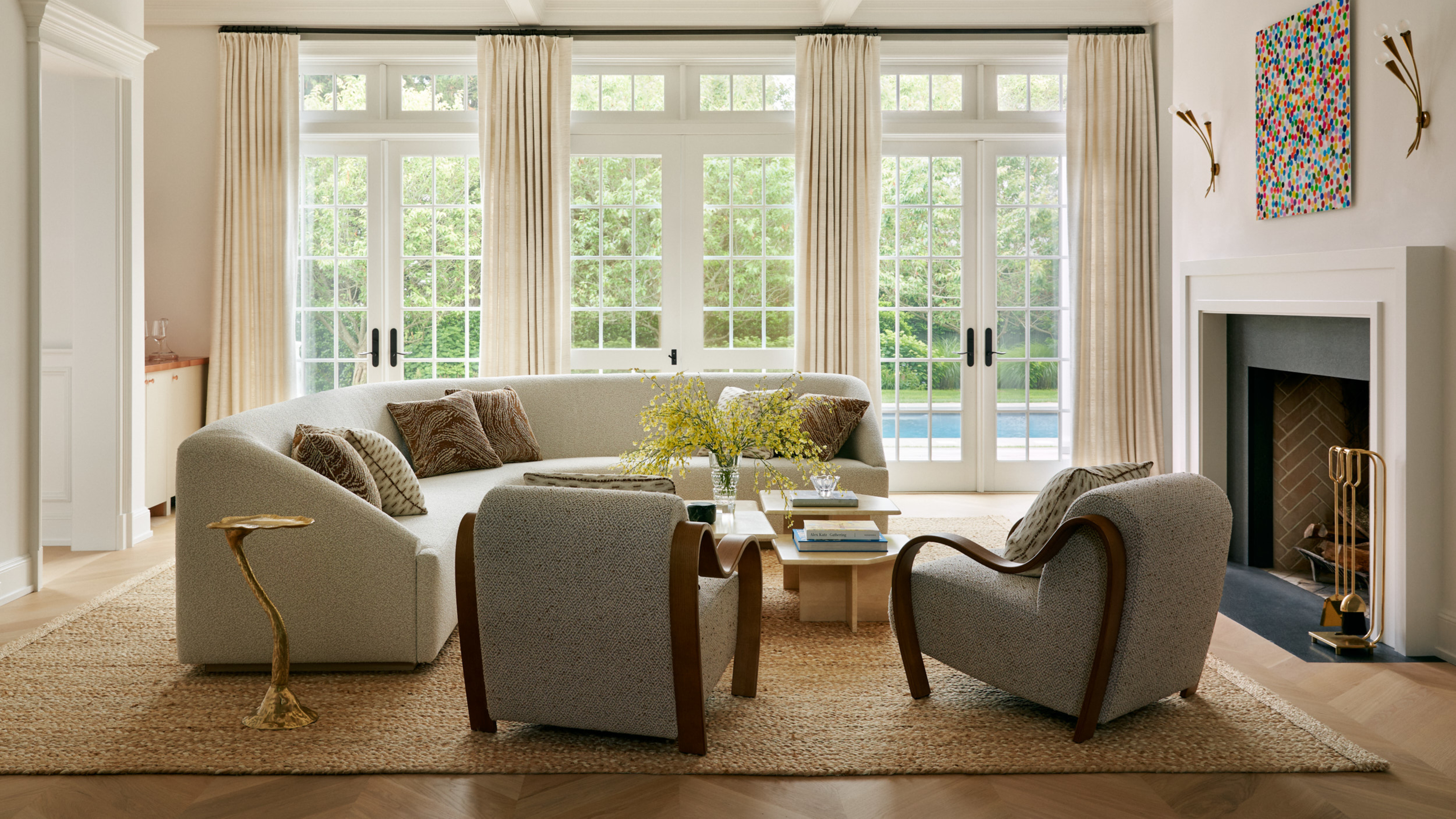 A curved sofa in a contemporary living room