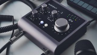 An Audient iD4 audio interface on a desk