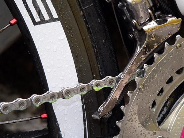 That distinctively nuclear-green hue of Shimano's grease is slathered on a T-Mobile rider's chain before the start of the rainy Stage 5.