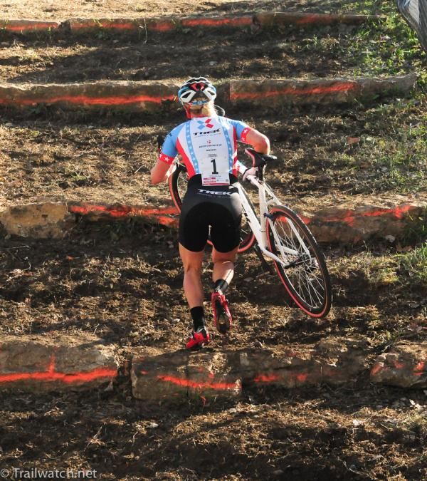 Katie Compton (Trek Cyclocross Collective) running the steps with the race lead